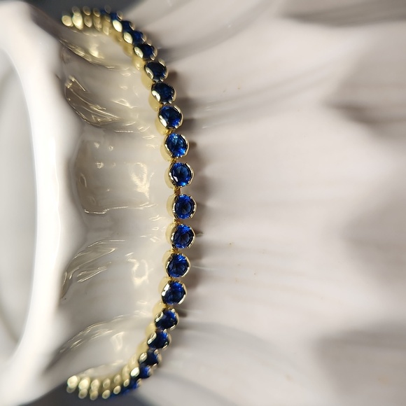 Pretty Bird Jewelry Jewelry - Yellow Gold Plated Tennis Bracelet With Blue Stones